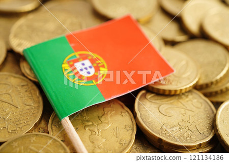 Portugal flag on coin and banknote money, finance trading investment business currency concept. Portugal flag on coin and banknote money, finance trading investment business currency concept. 121134186