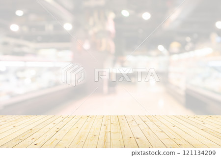 Empty wood table top with supermarket blurred background for product display Empty wood table top with supermarket blurred background for product display 121134209