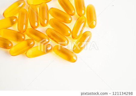 Fish oil or Cod liver oil gel in capsules with omega 3 vitamins, supplementary healthy food. 121134298