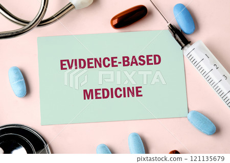 Evidence-based medicine displayed with medical tools and capsules in a well-organized arrangement Evidence-based medicine displayed with medical tools and capsules in a well-organized arrangement 121135679
