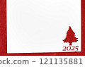 Christmas 2025 background. White paper with fir-tree shape cut for new year 2025 card on wooden table 121135881