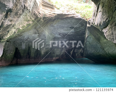 Take a sightseeing boat tour of the mysterious Blue Cave 121135974