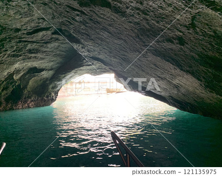 Take a sightseeing boat tour of the mysterious Blue Cave 121135975