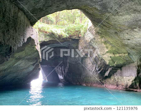 Take a sightseeing boat tour of the mysterious Blue Cave 121135976