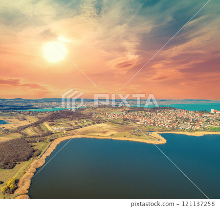 Top view of Lake Belso-to (Belso-to) and Lake Balaton during sunset. Tihany Peninsula, Hungary, Europe 121137258
