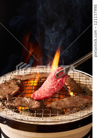 Domestic Wagyu beef grilled on a charcoal grill 121137998
