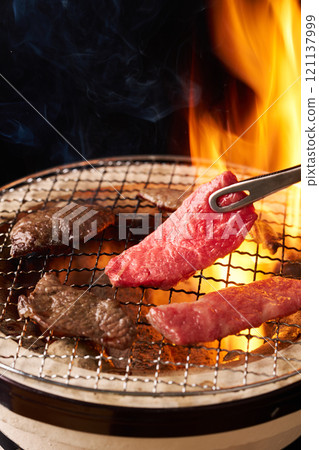 Domestic Wagyu beef grilled on a charcoal grill 121137999