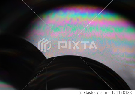 Silver liquid perfect forms on black background, fantastic abstraction, surreal water shapes, rainbow reflection,  121138188
