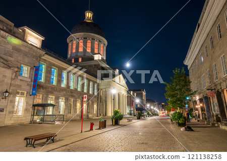 Montreal, Quebec, Canada - August 18 2021 : Night view of Saint Paul Street (Rue Saint-Paul) in Old Montreal. Bonsecours Market (Marche Bonsecours). 121138258