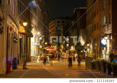 Montreal, Quebec, Canada - August 18 2021 : Night view of Old Montreal. Saint Paul Street (Rue Saint-Paul). Montreal, Quebec, Canada - August 18 2021 : Night view of Old Montreal. Saint Paul Street (Rue Saint-Paul). 121138263