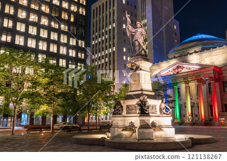 Montreal, Quebec, Canada - August 18 2021 : Night view of Place d'Armes in Old Montreal. Maisonneuve Monument. Montreal, Quebec, Canada - August 18 2021 : Night view of Place d'Armes in Old Montreal. Maisonneuve Monument. 121138267
