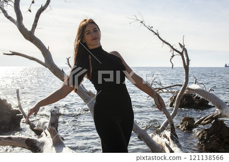 young pretty brunette woman on sea coast, lifestyle people concept close up 121138566