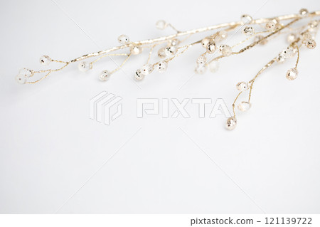 Gold twig decoration with balls on white background Gold twig decoration with balls on white background 121139722