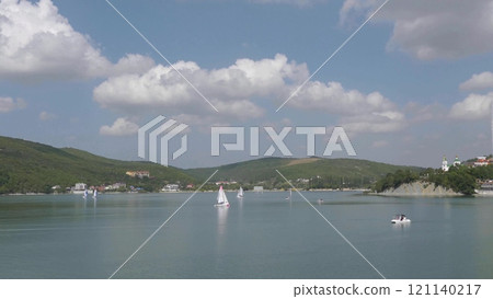 Abrau Durso, Russia 28 August 2024: Panoramic view of the lake Abrau-Durso with sailboats on a sunny day 121140217