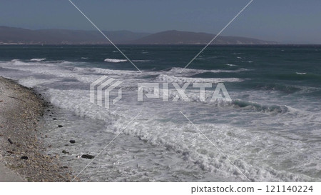 Novorossiysk, Russia - 18 August 2023. red port ship name Maverick in the port of Novorossiysk Black Sea 121140224