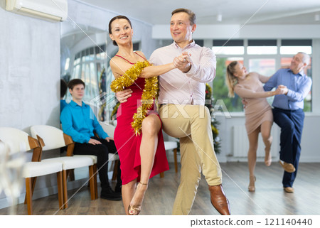 Adult couple dancing Adult couple dancing 121140440