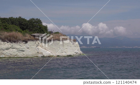 Black sea coast. bald mountain. Beautiful blue sea in Novorossiysk Black sea coast. bald mountain. Beautiful blue sea in Novorossiysk 121140474