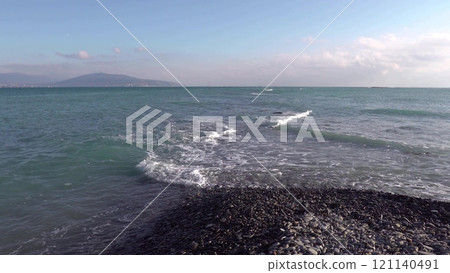 Novorossiysk, Russia - 18 August 2023. red port ship name Maverick in the port of Novorossiysk Black Sea 121140491