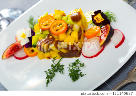 Raw tuna tartare with mango and avocado 121140657