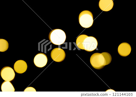 Beautiful Golden Bokeh Lights Shimmering on a Black Background overlay Beautiful Golden Bokeh Lights Shimmering on a Black Background overlay 121144103