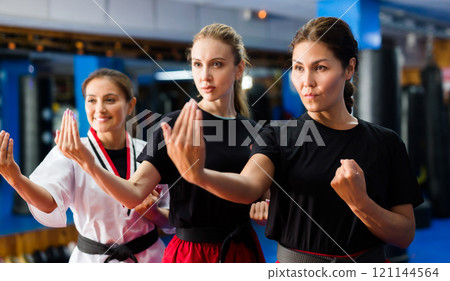 Women doing kata 121144564