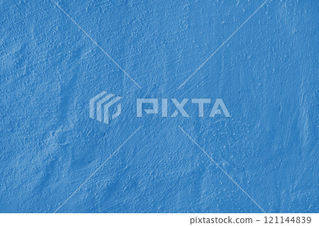 Textured blue plaster wall surface with brushstroke, painted, aged concrete background 121144839
