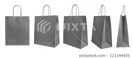 Various perspectives of gray recycled paper shopping bags isolated on white background Various perspectives of gray recycled paper shopping bags isolated on white background 121144850
