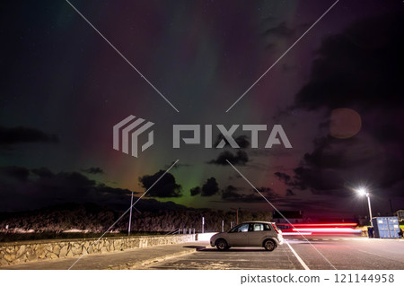 The Aurora Borealis, the northern lights, showing up in Portnoo, County Donegal, Ireland. 121144958
