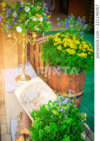 Beautiful romantic elegant wedding decor for a luxury dinner in restaurant. Modern floral design for outdoor wedding in rustic style 121146067