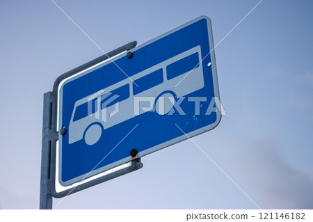 Bus stop sign and a cloudy evening sky, Norway 121146182