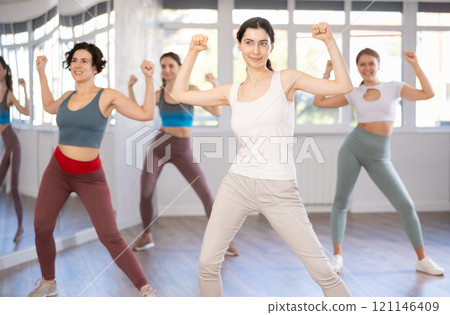 Group of women dancing dancehall in studio 121146409