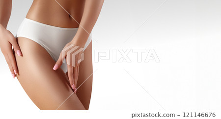 Spa, wellness. Healthy slim body. Beautiful sexy hips. Fitness or plastic surgery. Perfect buttocks without cellulite 121146676