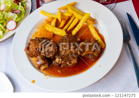 Oxtail in sauce - Rabo de toro. Spanish dish Oxtail in sauce - Rabo de toro. Spanish dish 121147275