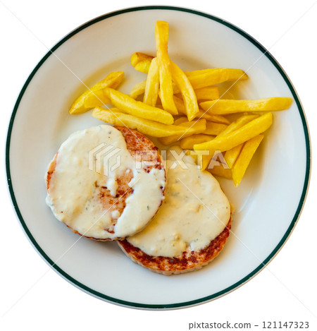 Roasted turkey breast steaks with Roquefort cheese sauce served with fried potato Roasted turkey breast steaks with Roquefort cheese sauce served with fried potato 121147323