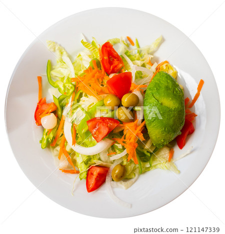 Fresh vegetable salad served with avocado 121147339