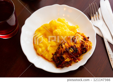 Chicken fillet with mushrooms and mashed potatoes. Russian or Belarusian cuisine Chicken fillet with mushrooms and mashed potatoes. Russian or Belarusian cuisine 121147366
