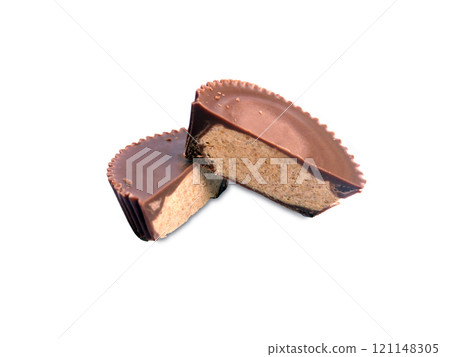Peanut butter cup cutted on white Peanut butter cup cutted on white 121148305