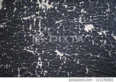 damage Leather with a cracked texture on a sofa . 121148881