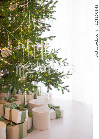 New year tree. Classic christmas New Year decorated room. Christmas tree with glass decorations. Christmas eve at home New year tree. Classic christmas New Year decorated room. Christmas tree with glass decorations. Christmas eve at home 121150142