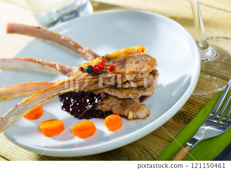 Delicious baked lamb ribs Delicious baked lamb ribs 121150461