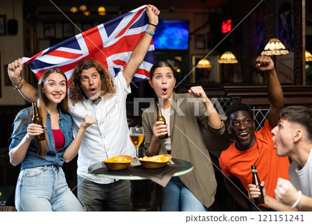 United Kingdom sports fans supporting their favourite team in pub United Kingdom sports fans supporting their favourite team in pub 121151241