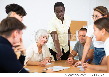 Diverse people on language courses in classroom 121151246