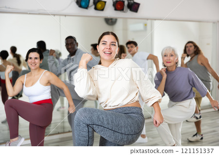Group of people of different nationalities learn sports dance Group of people of different nationalities learn sports dance 121151337