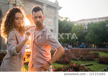 Couple dancing salsa swing in front of Puerta de Alcala in Madrid 121151842