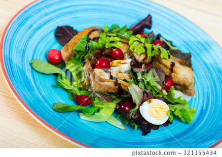 Salad with quail, berries and sauce Salad with quail, berries and sauce 121155434