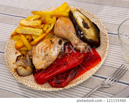 Chicken with stewed vegetables and potatoes Chicken with stewed vegetables and potatoes 121155480