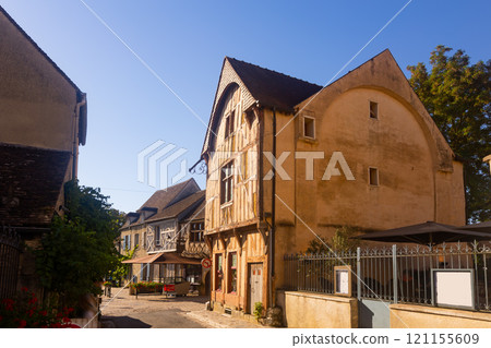 Street in old district of Provins town with wooden timber-framed houses 121155609