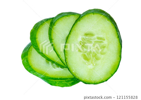 Thinly sliced cucumber isolated on white. Thinly sliced cucumber isolated on white. 121155828