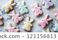 Whimsical bunny shaped cookies in pastel colors with decorative icing 121156813