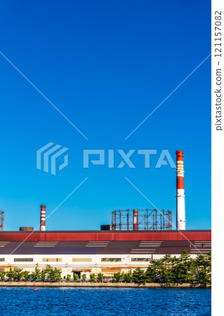 Morning view of Kitakyushu factory (Nippon Steel Kyushu Steel Works) near Matsuyama sightseeing ferry terminal [Kitakyushu City, Fukuoka Prefecture] 121157082